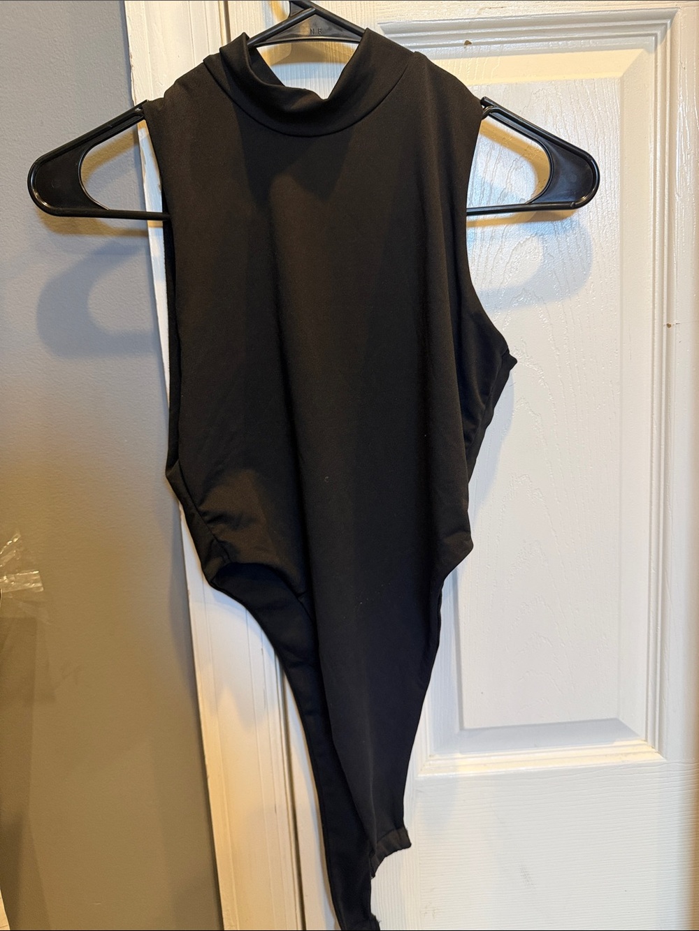 Adika Black Sleeveless High-Neck Bodysuit